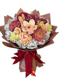 Buchet comestibil din marshmallow – flori în nuanțe calde de roz și piersică