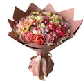 Buchet comestibil din marshmallow – flori pastel în nuanțe roz & piersică